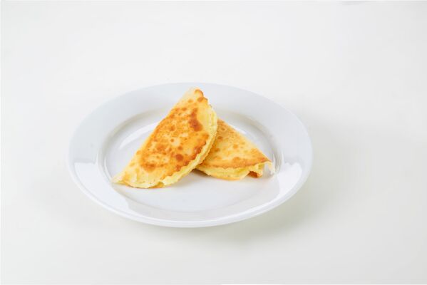 Kystybai, una torta frita rellena de un cremoso puré de patatas - Sputnik Mundo