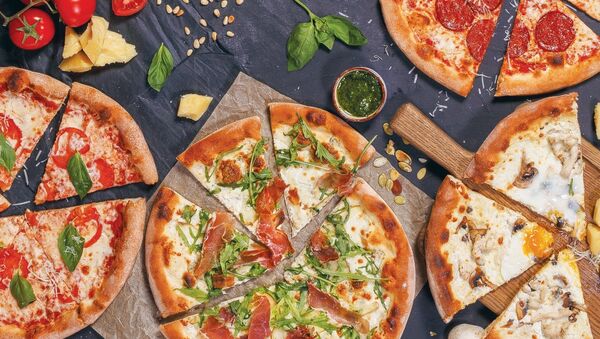 Pizza en el restaurante Donna Olivia - Sputnik Mundo