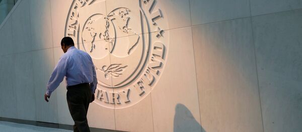 Logo del FMI en la sede de la organización en Washington - Sputnik Mundo