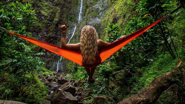 Jóven sobre hamaca (imagen referencial) - Sputnik Mundo