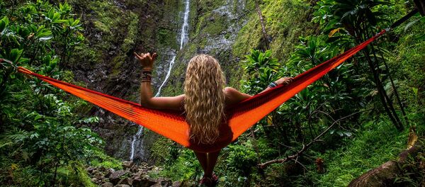Jóven sobre hamaca (imagen referencial) - Sputnik Mundo