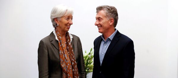 El presidente de Argentina, Mauricio Macri, junto a la directora del Fondo Monetario Internacional, Christine Lagarde - Sputnik Mundo