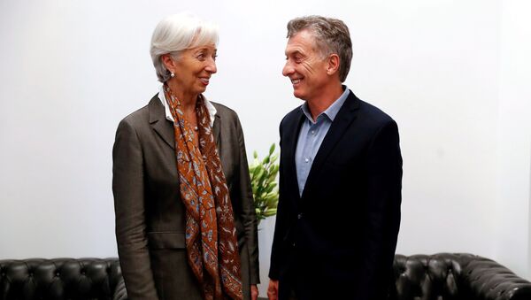 El presidente de Argentina, Mauricio Macri, junto a la directora del Fondo Monetario Internacional, Christine Lagarde - Sputnik Mundo