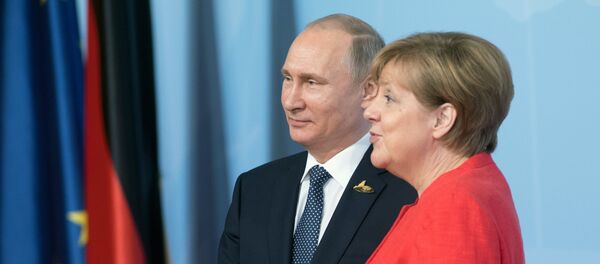 El presidente de Rusia, Vladímir Putin y la canciller de Alemania, Angela Merkel - Sputnik Mundo
