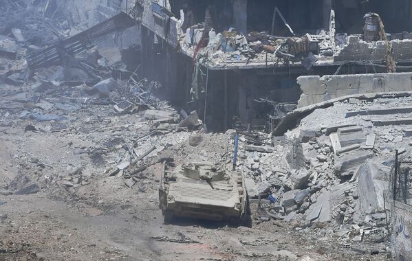 Las Fuerzas Armadas de Siria asaltan las posiciones de los terroristas a las afueras de Damasco - Sputnik Mundo