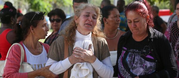 Familiares de las víctimas del estrello del avión Boeing 737 en Cuba - Sputnik Mundo