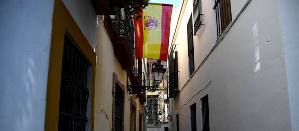 Bandera de España en Sevilla - Sputnik Mundo