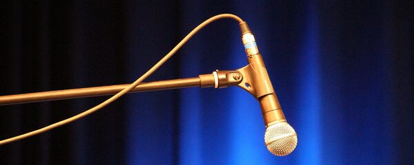 Un micrófono (imagen referencial) - Sputnik Mundo
