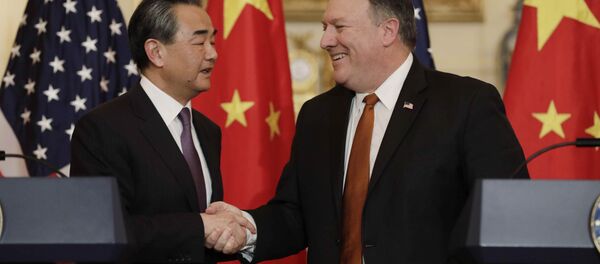 Wang Yi, canciller de China y Mike Pompeo, secretario de Estado de EEUU - Sputnik Mundo