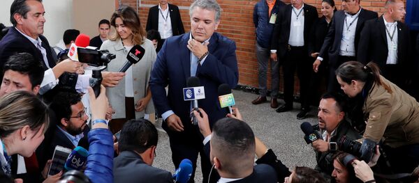 Iván Duque durante la jornada electoral del 27 de mayo Iván Duque durante la jornada electoral del 27 de mayo - Sputnik Mundo