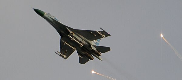 Un caza ucraniano en el cielo sobre Lugansk - Sputnik Mundo