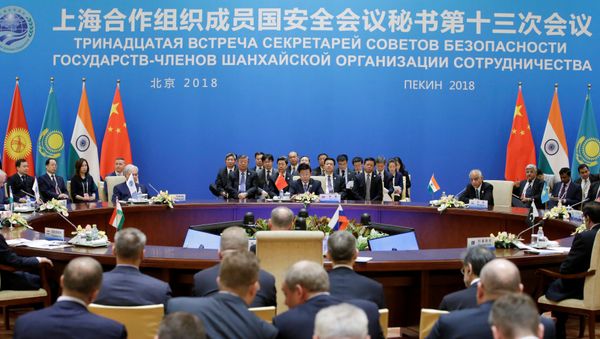 La delegación china durante la reunión de la OCS La delegación china durante la reunión de la OCS - Sputnik Mundo