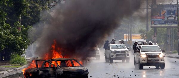 Policía durante protestas en Nicaragua - Sputnik Mundo