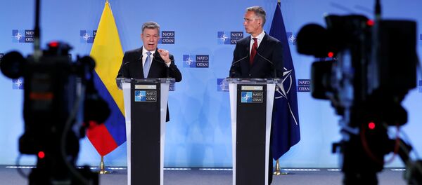 Juan Manuel Santos, presidente de Colombia, y Jens Stoltenberg, secretario general de la OTAN - Sputnik Mundo
