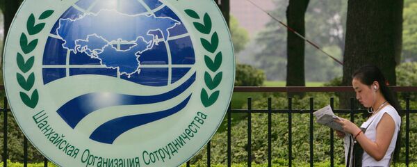 El logo de la Organización de Cooperación de Shanghái (OCS) El logo de la Organización de Cooperación de Shanghái (OCS) - Sputnik Mundo