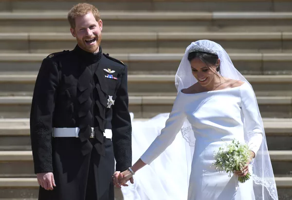 El príncipe Harry con su esposa, Meghan Markle