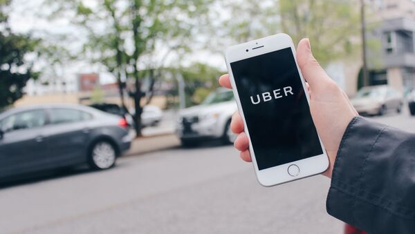 Una app de Uber - Sputnik Mundo