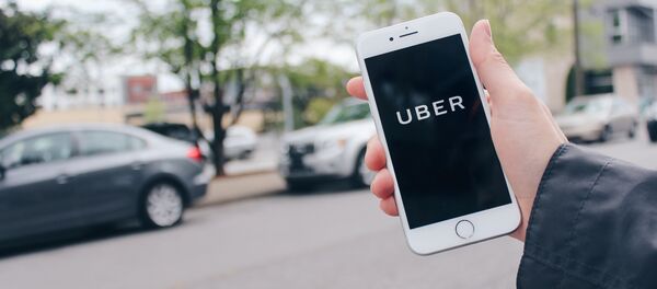 Una app de Uber - Sputnik Mundo