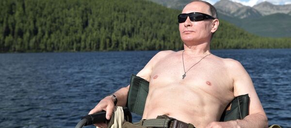 Vladímir Putin durante las vacaciones en la República Tuvá de Rusia en 2017 - Sputnik Mundo