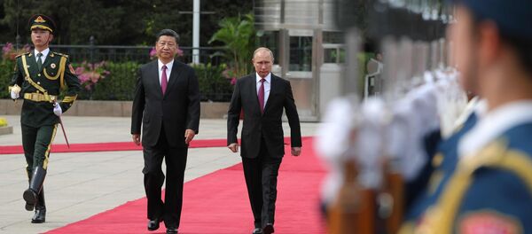 Presidente de China, Xi Jinping, y presidente de Rusia, Vladímir Putin - Sputnik Mundo