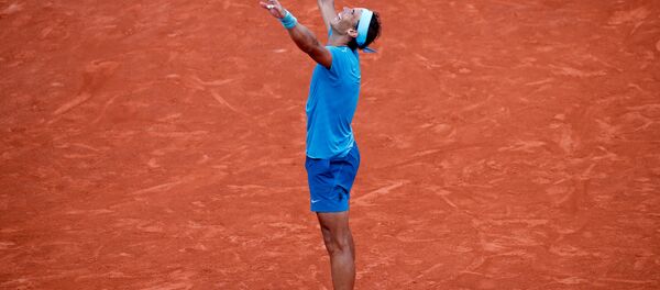 Rafael Nadal, tenista español, logra su undécimo título en el Abierto de Francia - Sputnik Mundo