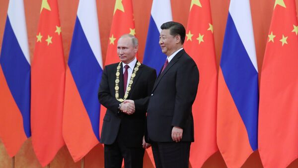 El presidente de Rusia, Vladímir Putin, y el presidente de China, Xi Jinping - Sputnik Mundo