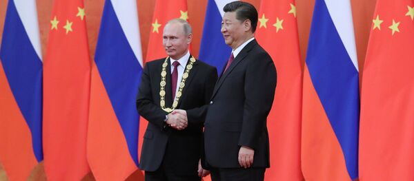 El presidente de Rusia, Vladímir Putin, y el presidente de China, Xi Jinping El presidente de Rusia, Vladímir Putin, y el presidente de China, Xi Jinping - Sputnik Mundo