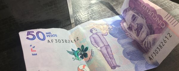Pesos colombianos - Sputnik Mundo