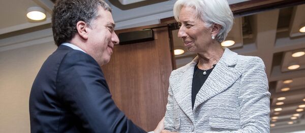 El ministro de Hacienda de Argentina, Nicolás Dujovne, y la directora del FMI, Christine Lagarde - Sputnik Mundo