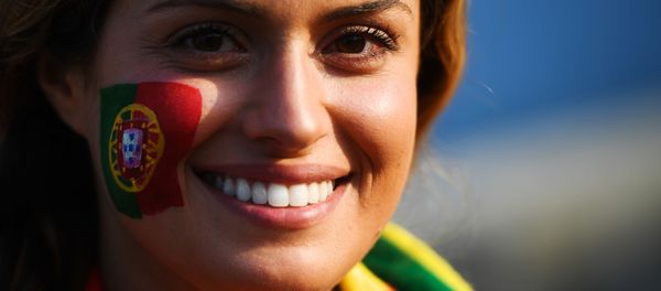 A fan of the Portugal national team before the start of a group stage match between Portugal and Spain. A fan of the Portugal national team before the start of a group stage match between Portugal and Spain. - Sputnik Mundo