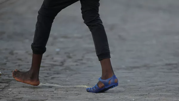 Un migrante (imagen referencial) - Sputnik Mundo