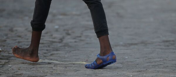 Un migrante (imagen referencial) - Sputnik Mundo