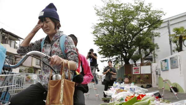 Los japoneses homenajean víctimas del terremoto Los japoneses homenajean víctimas del terremoto - Sputnik Mundo