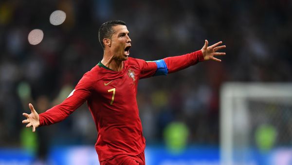 Cristiano Ronaldo, futbolista portugués, celebra su gol contra España en la fase de grupos del Mundial 2018 Cristiano Ronaldo, futbolista portugués, celebra su gol contra España en la fase de grupos del Mundial 2018 - Sputnik Mundo