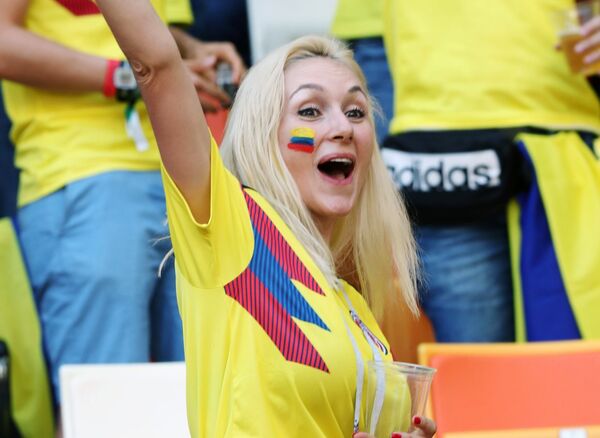 El mundo en las mejillas de las hermosas hinchas del Mundial de Rusia - Sputnik Mundo