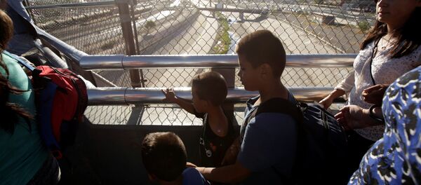 Migrantes en la frontera con EEUU - Sputnik Mundo