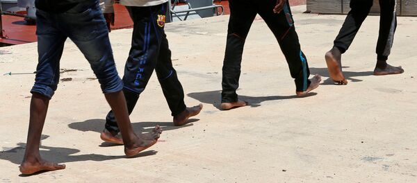 Migrantes (imagen referencial) Migrantes (imagen referencial) - Sputnik Mundo