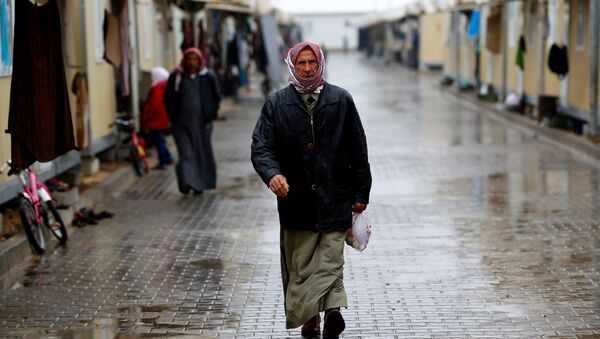Un refugiado sirio en Turquía - Sputnik Mundo