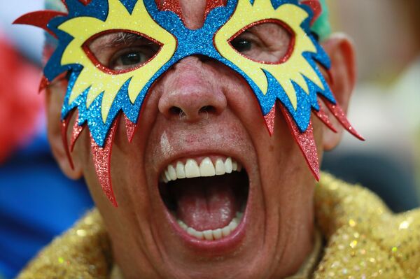 Un hincha de la selección nacional colombiana antes del partido de los octavos del final entre Colombia e Inglaterra - Sputnik Mundo