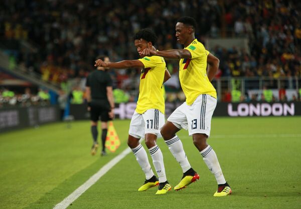 Cuadrado y Mina se alegran por el gol de Colombia - Sputnik Mundo