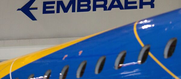 Logo de la empresa brasileña Embraer - Sputnik Mundo