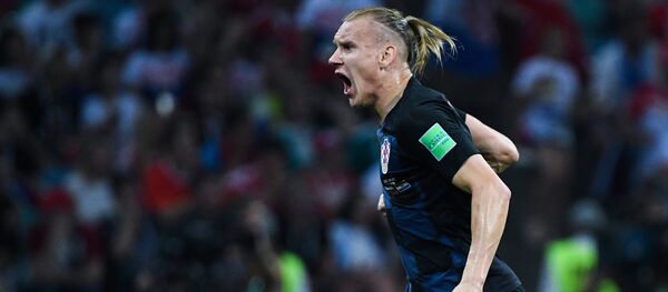Domagoj Vida (Croacia) tras un gol anotado en el partido de los 1/4 del final entre los equipos nacionales de Rusia y Croacia - Sputnik Mundo