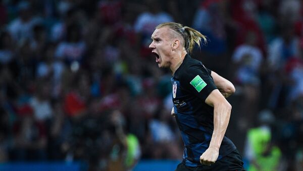 Domagoj Vida (Croacia) tras un gol anotado en el partido de los 1/4 del final entre los equipos nacionales de Rusia y Croacia - Sputnik Mundo