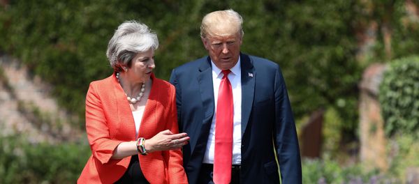 La primera ministra del Reino Unido, Theresa May y el presidente de EEUU, Donald Trump - Sputnik Mundo