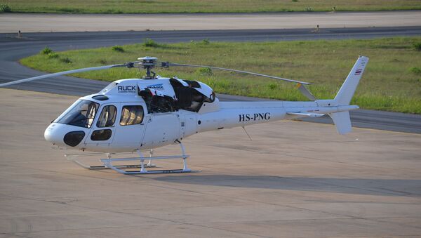 Un helicóptero - Sputnik Mundo