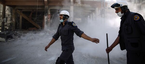 Activistas de la organización Cascos Blancos (archivo) - Sputnik Mundo