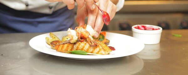 Un plato de pescado y mariscos - Sputnik Mundo