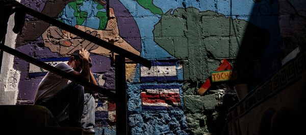 Migrante centroamericano en el albergue Casa Tochán, espera la resolución de su refugio - Sputnik Mundo