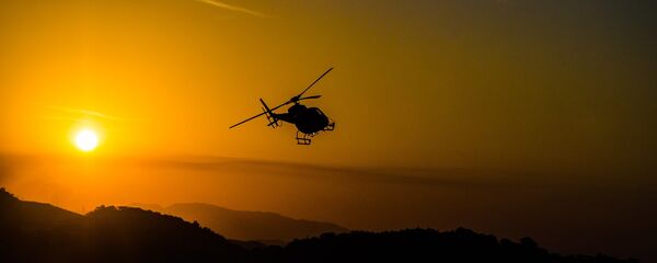 Un helicóptero (imagen referencial) - Sputnik Mundo
