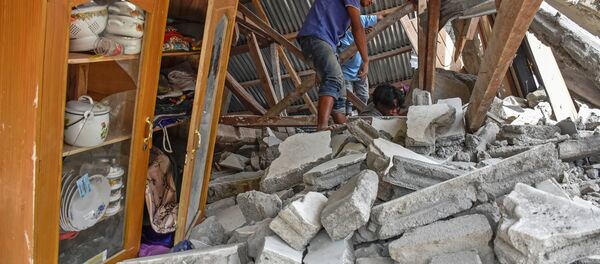 Consecuencias de un sismo en Indonesia - Sputnik Mundo